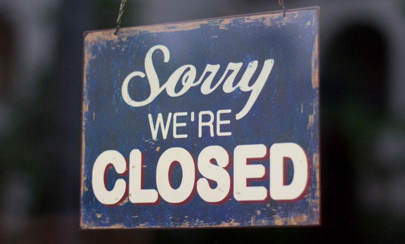 Sorry we're closed sign